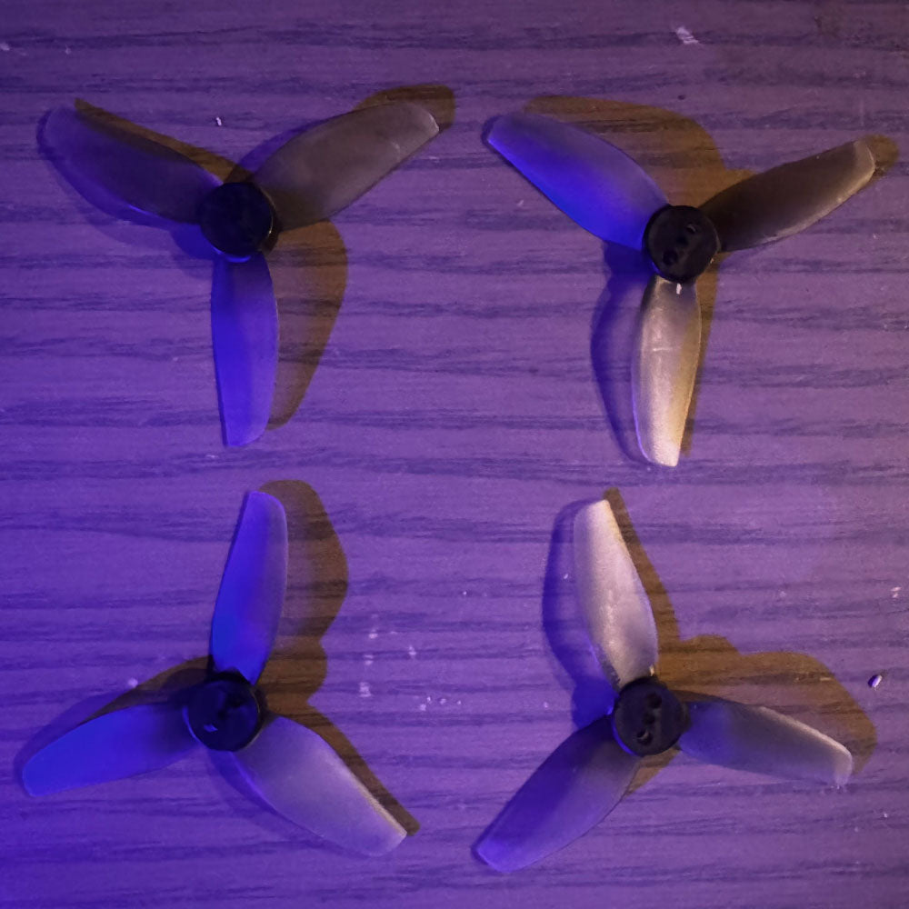 Micro drone prop set HQProp T2.2X1.6X3GR, 3-blade design for thrust and control in tight FPV flying environments.
