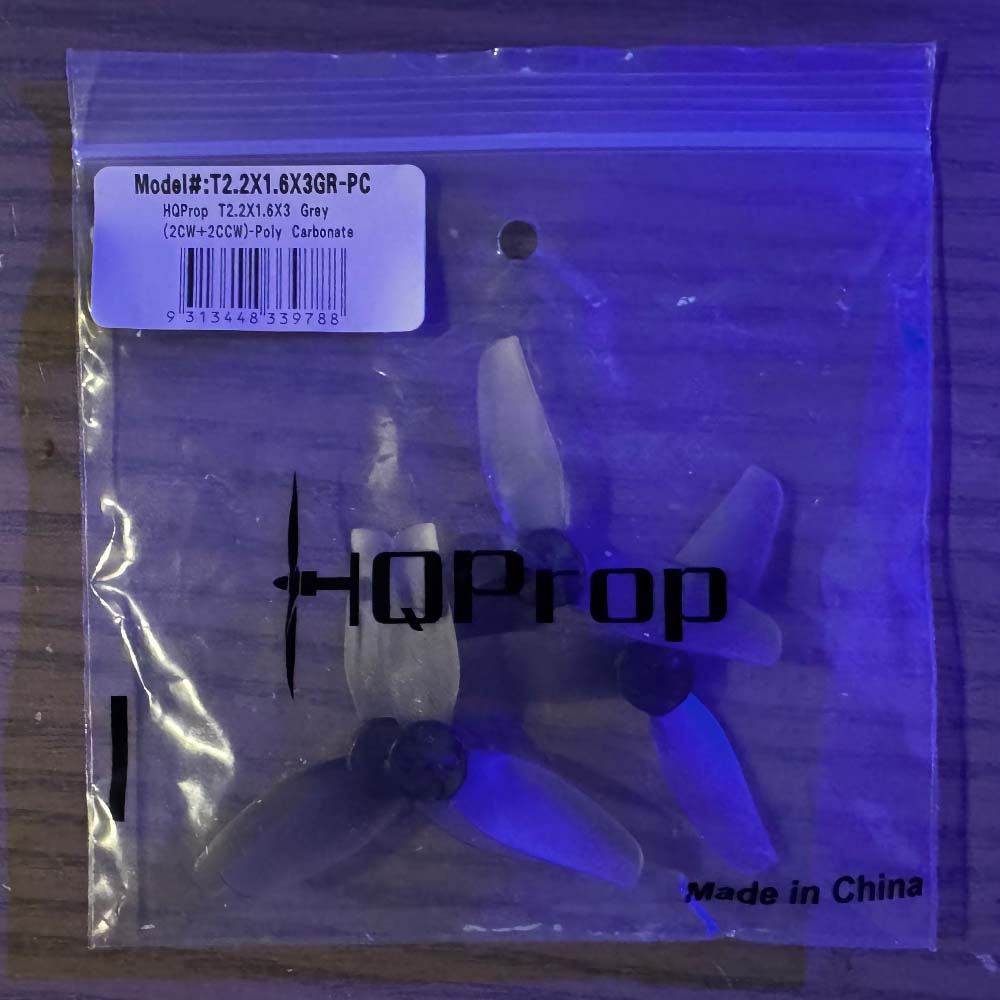Micro drone prop set HQProp T2.2X1.6X3GR, 3-blade design for thrust and control in tight FPV flying environments.