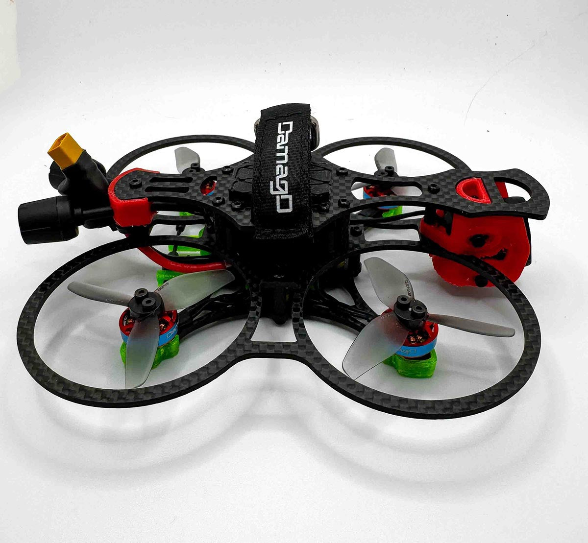 Side view of the fully built Osito FPV drone with Vandal 1303 motors and TPU components; a compact hybrid rig comparable to the RCINPOWER-powered Itsy Spydr and cinematic frames like the Pavo 20 Pro