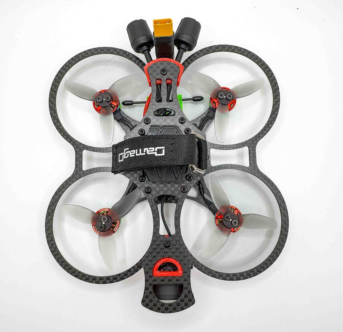 Top view of the fully built Osito FPV drone with Vandal 1303 motors and TPU components; a compact hybrid rig comparable to the RCINPOWER-powered Itsy Spydr and cinematic frames like the Pavo 20 Pro