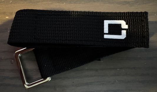 Close up shot of the DamagD LiPo battery strap with white DamagD "D" logo for FPV drones. 